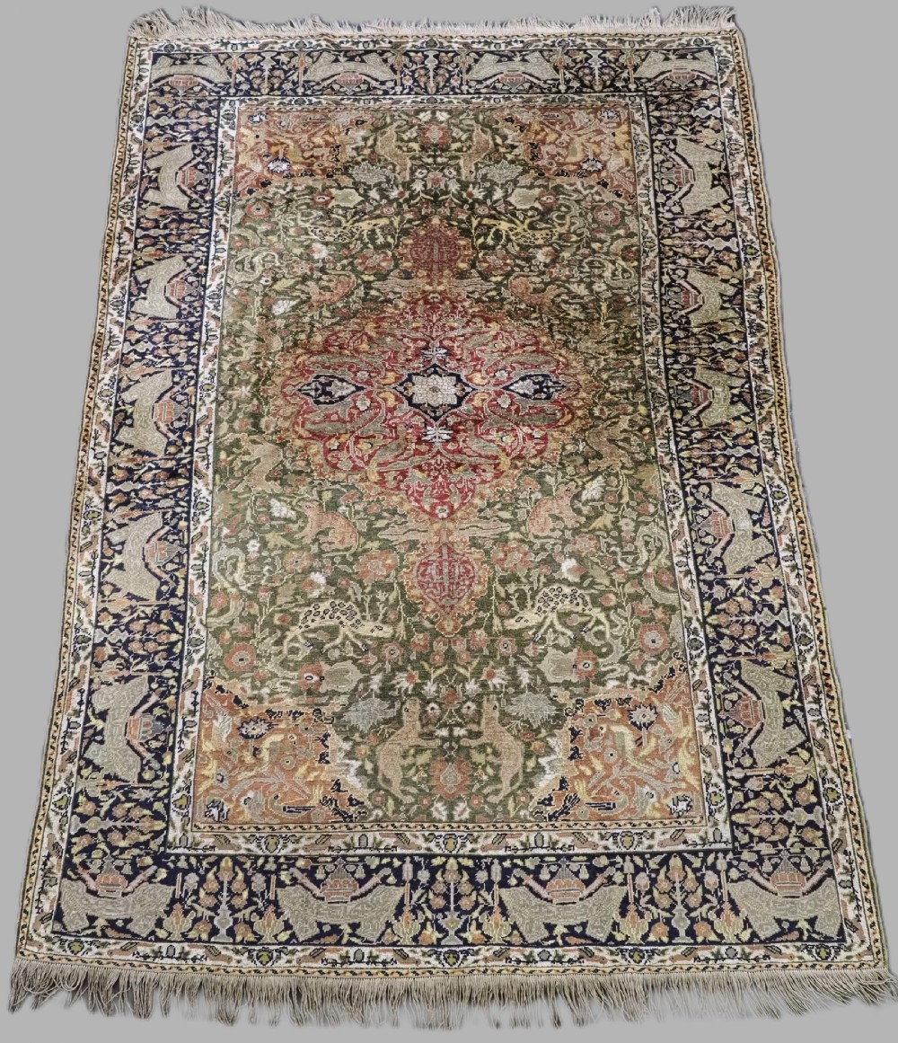 antique turkish kayseri pictorial silk rug with hunting design circa 1890
