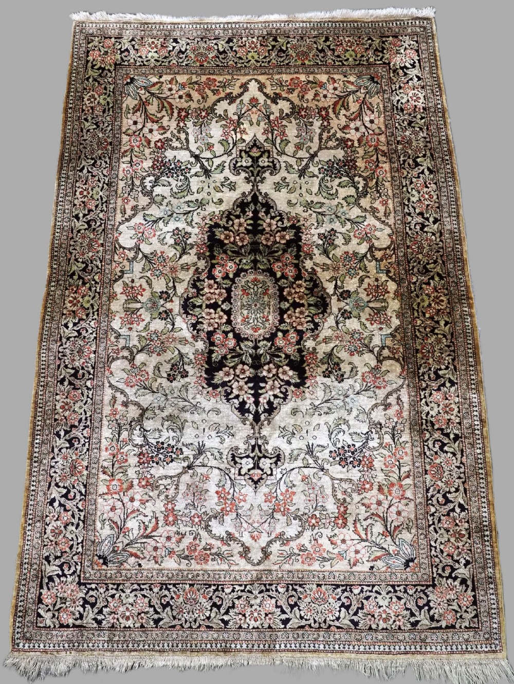 vintage persian qum silk rug small medallion design with pastel colours about 50 years old
