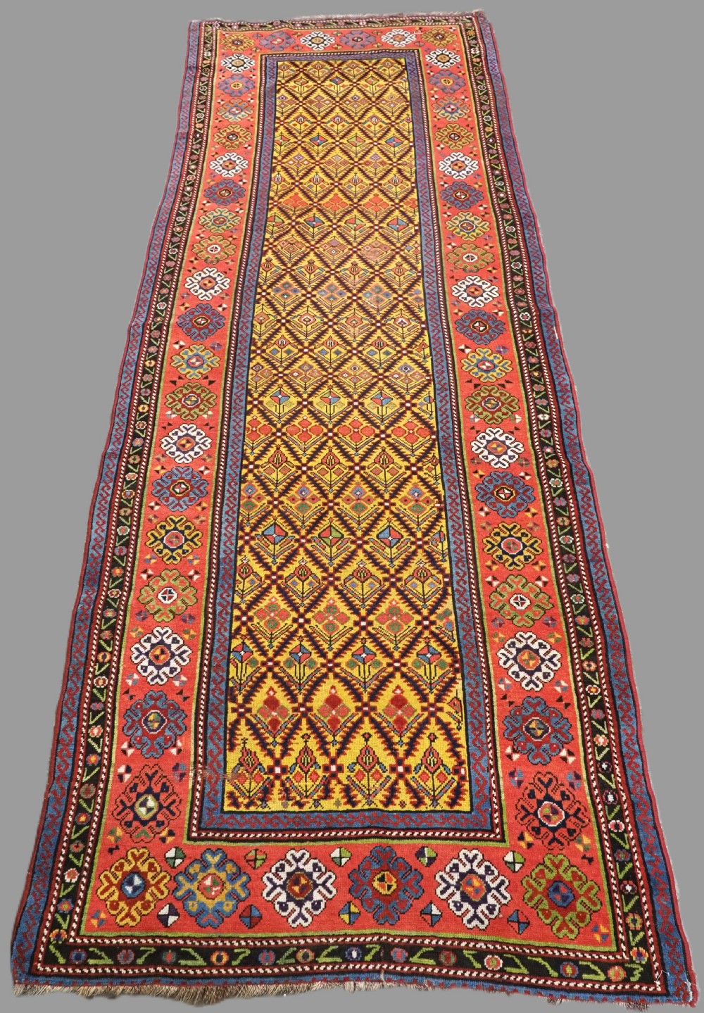 antique caucasian gendje kazak long rug runner with floral lattice design circa 1890