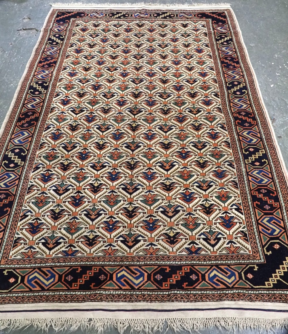 vintage turkish kazak carpet with caucasian shirvan lattice design about 40 years old