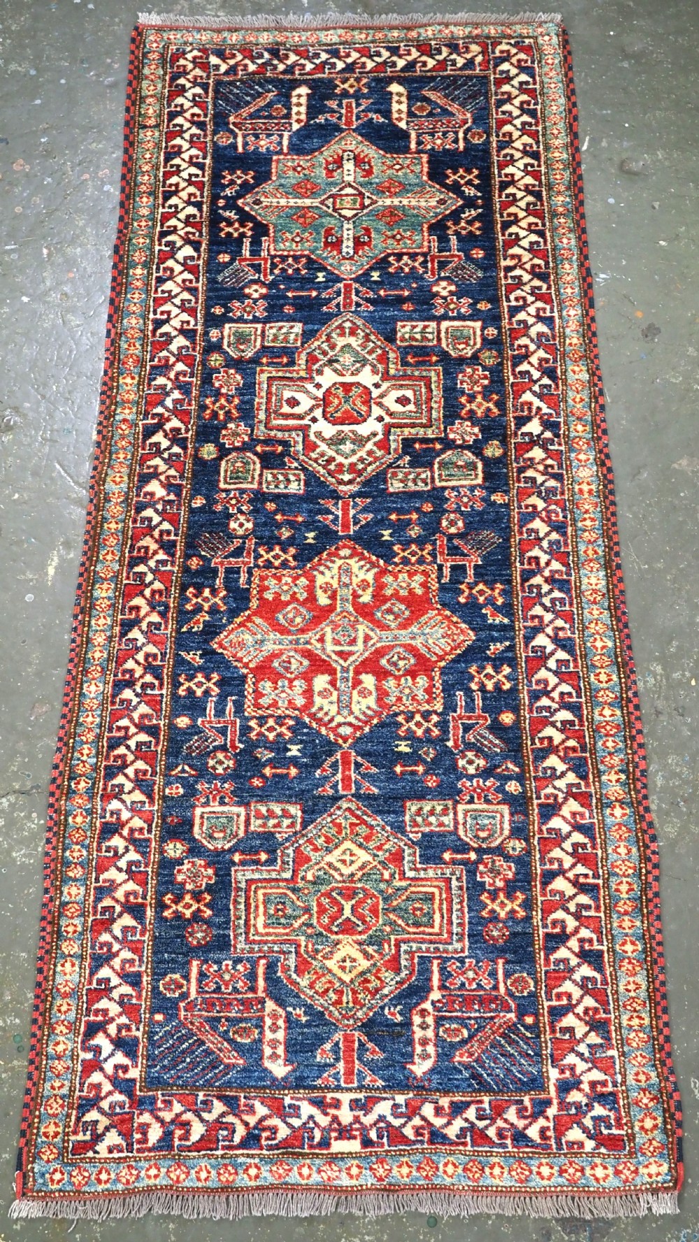 hand knotted afghan runner in traditional caucasian kazak design about 10 years old