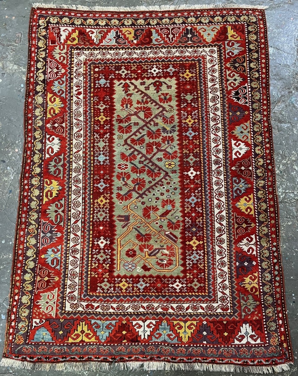 antique turkish milas rug with scarce green ground mid 19th century