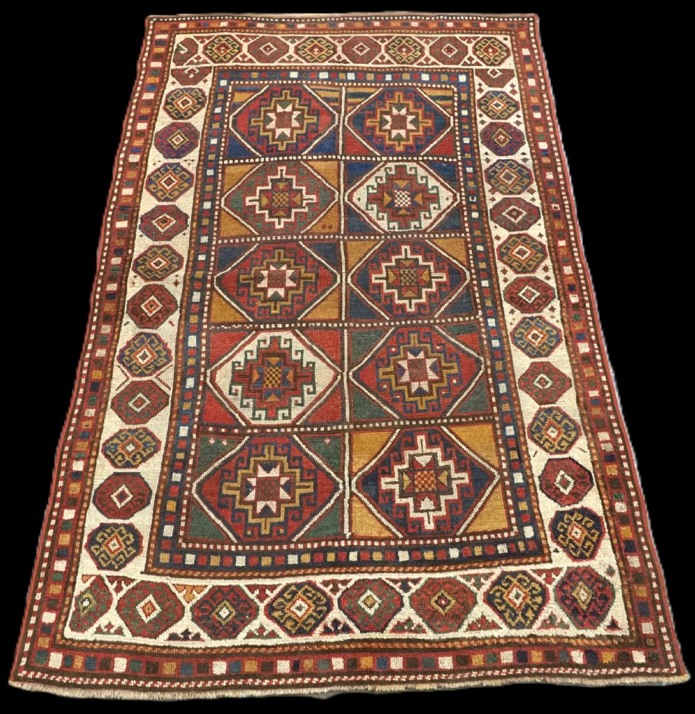 antique caucasian moghan kazak rug classic design with soft colours circa 1900