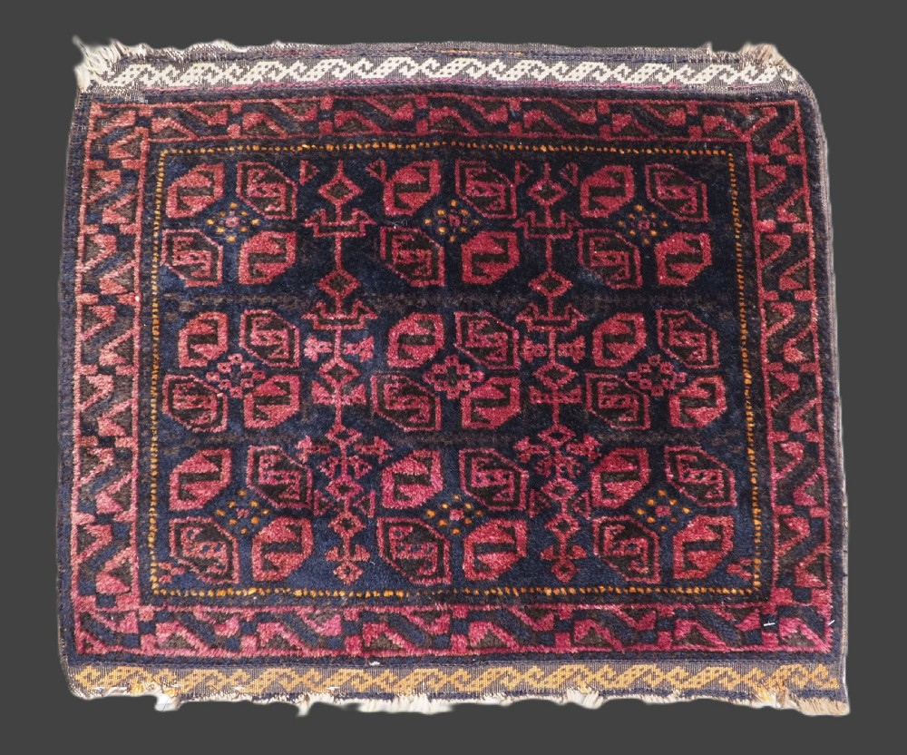 antique baluch saddle bag face with 'tile' design circa 1900