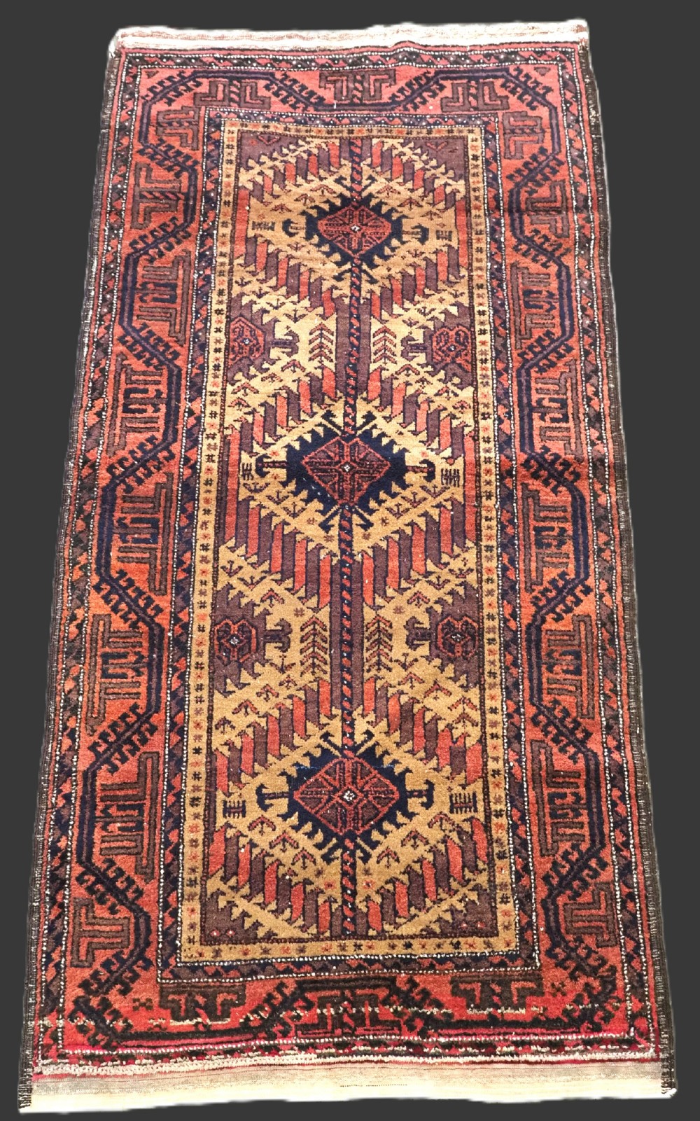 antique baluch rug with camel ground 3 latch hook medallion design circa 190020