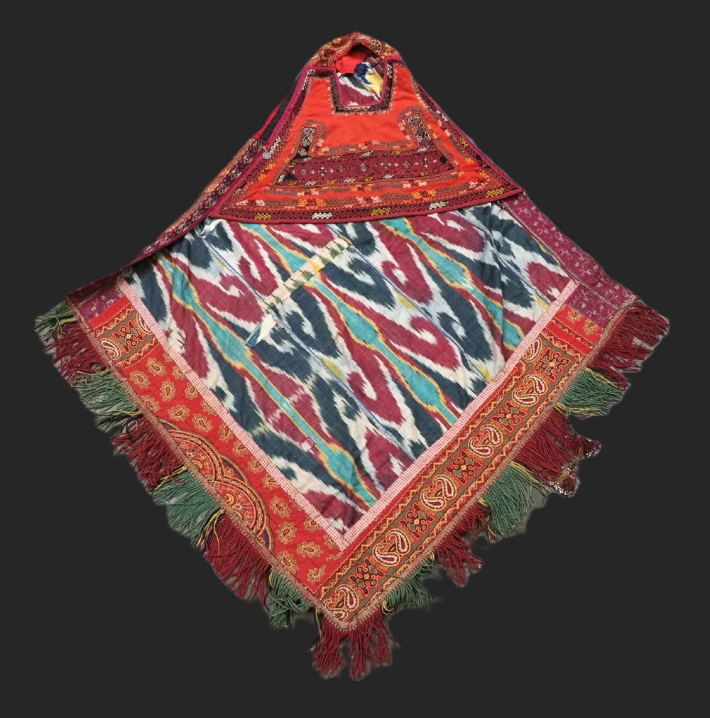 a rare uzbek karakalpak ladies embroidered wedding veil with silk ikat back 19th century