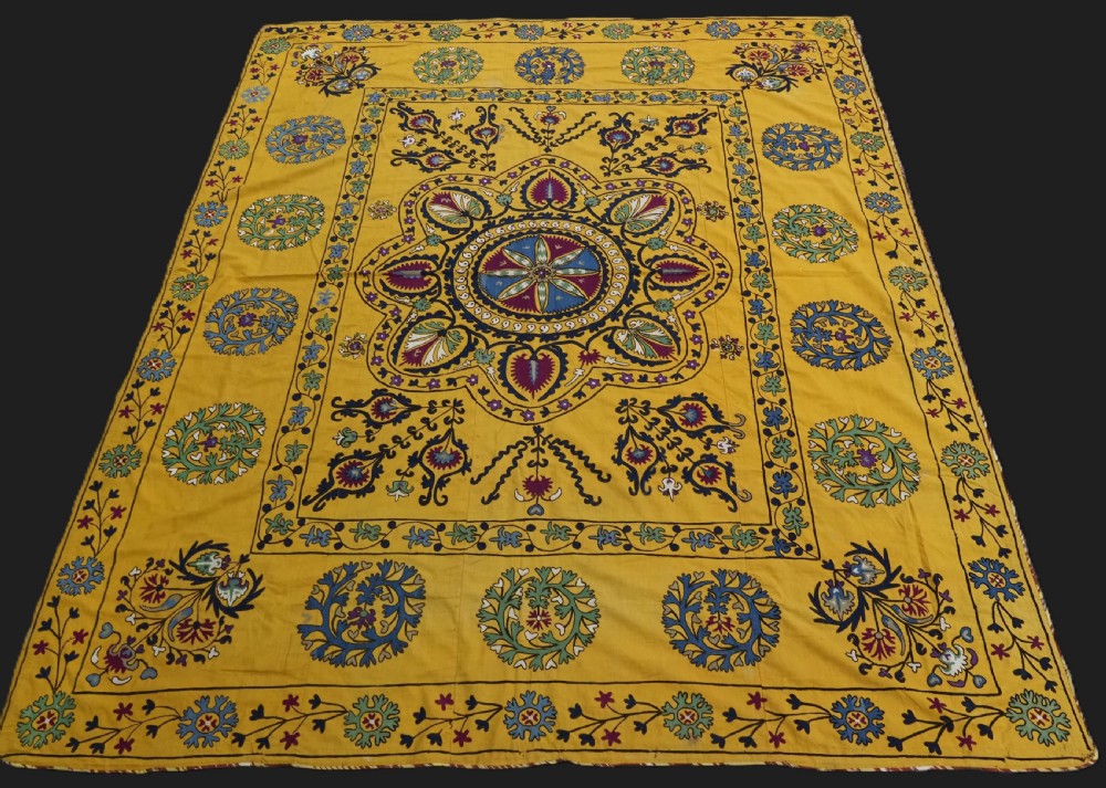 antique uzbek suzani silk embroidery on a yellow cotton ground circa 1900