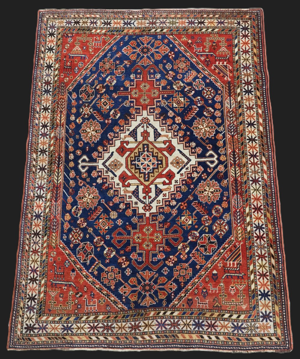 antique qashqai tribal rug with single medallion peacocks circa 1900