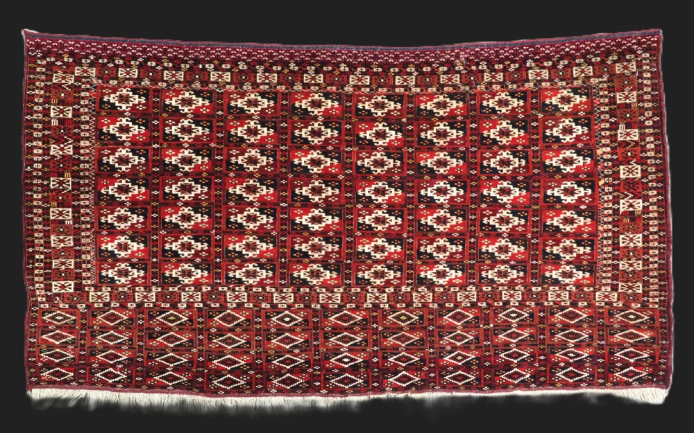 antique tekke turkmen chuval face of scarce format with aina gul design circa 1880