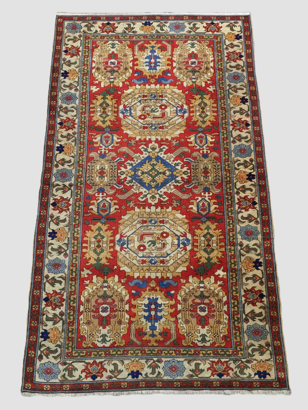 antique rug in the style of a caucasian karabagh 18th century 'blossom' rug circa 1920