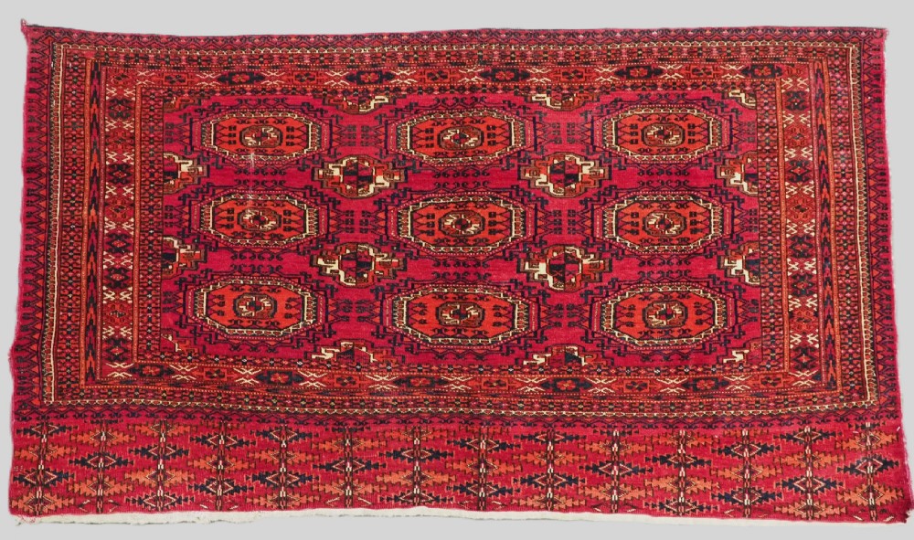 antique tekke turkmen chuval face with 9 salor turreted guls circa 1900