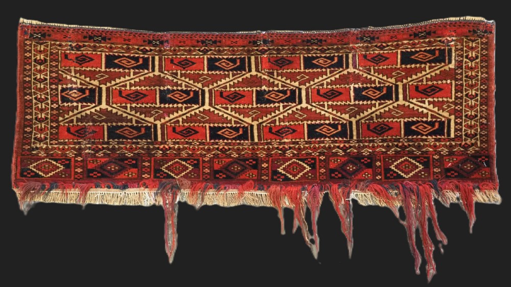 antique tekke turkmen torba face with curled leaf design very fine weave circa 185075