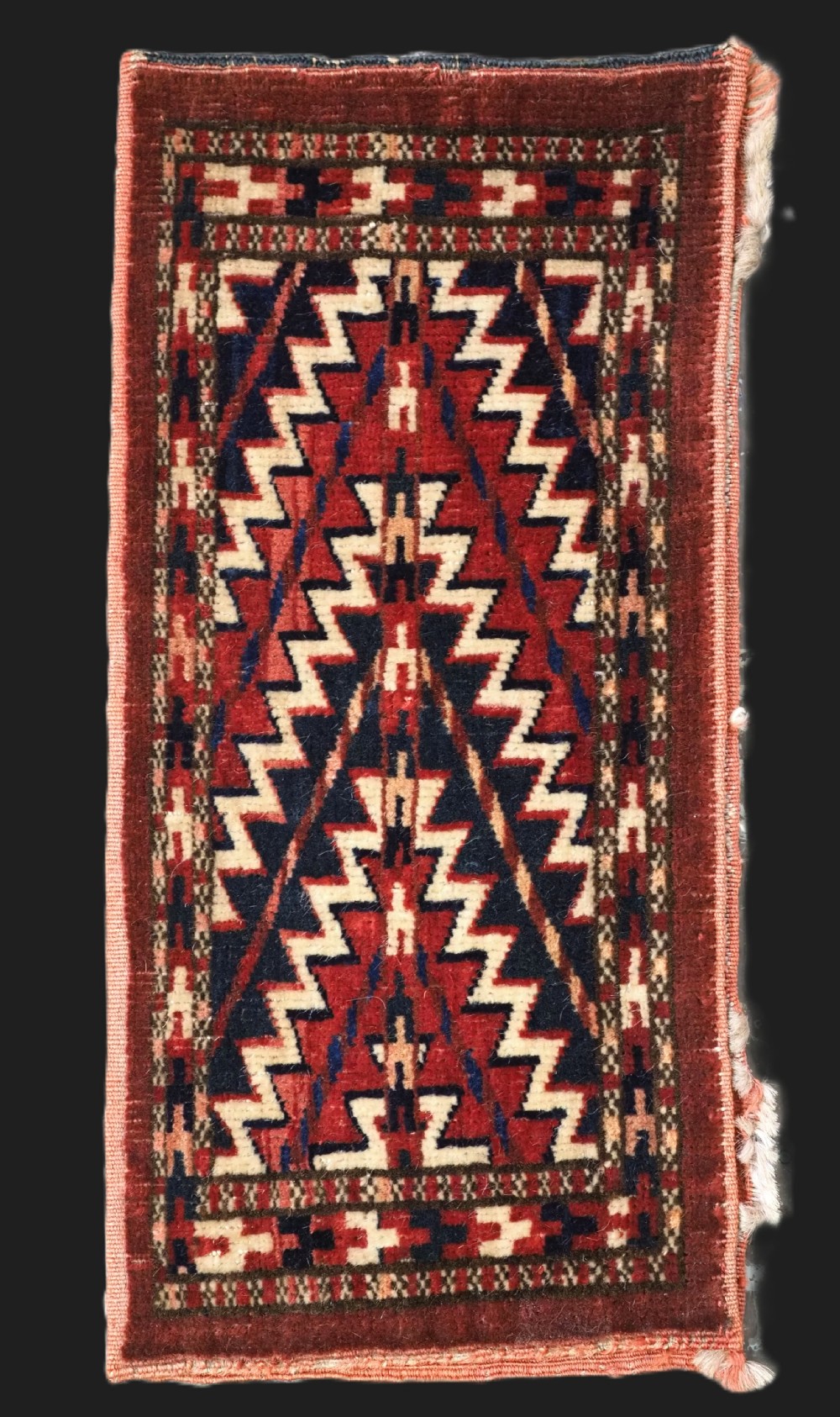 antique yomut turkmen spindle bag with plain weave back circa 1900