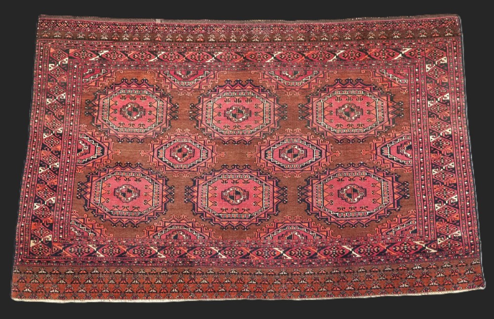 antique saryk turkmen chuval face with six large salor turreted guls circa 1880