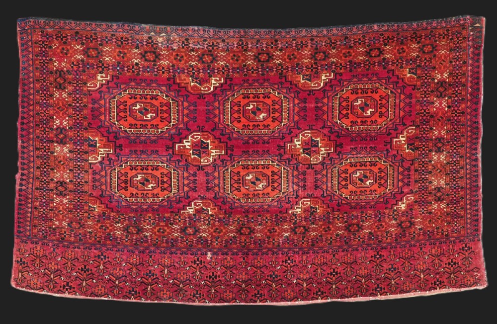 antique tekke turkmen chuval face with six turreted 'salor' guls circa 1900