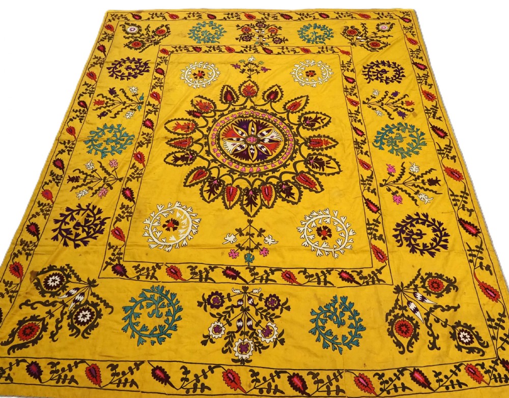 antique uzbek suzani silk embroidery on a yellow cotton ground circa 1900