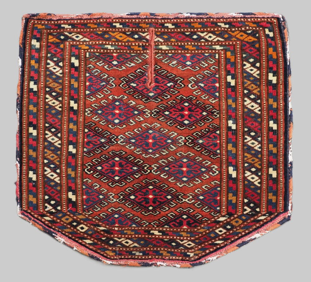 antique yomut turkmen saddle cover rug with classic design circa 1920